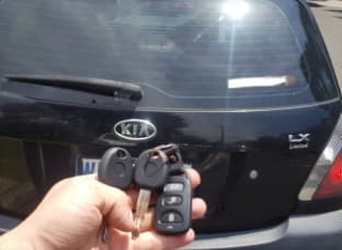 kia rio 2008 remote key image